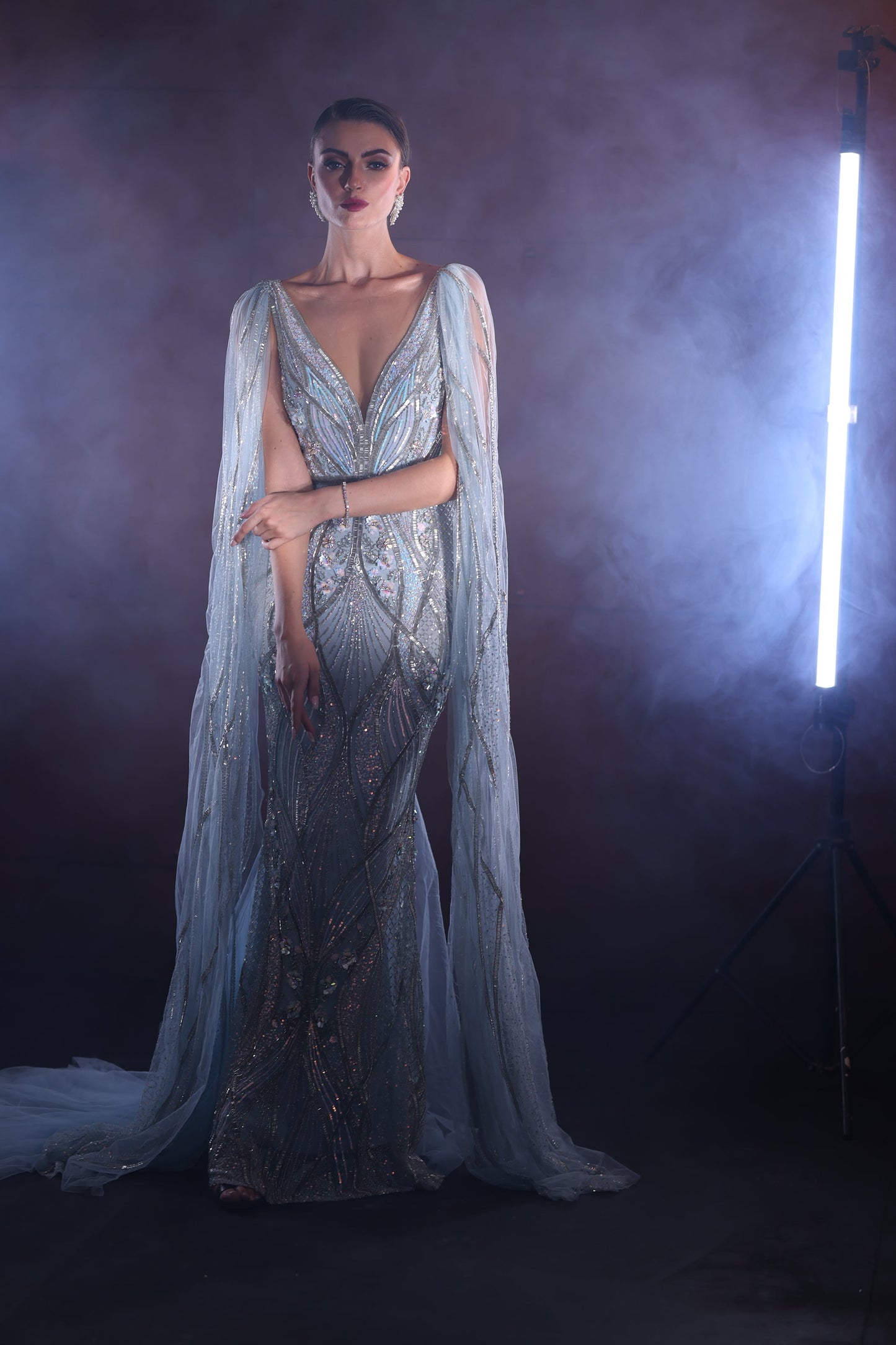 HOUSE OF MISU IN POWDER BLUE GOWN WITH WINGS
