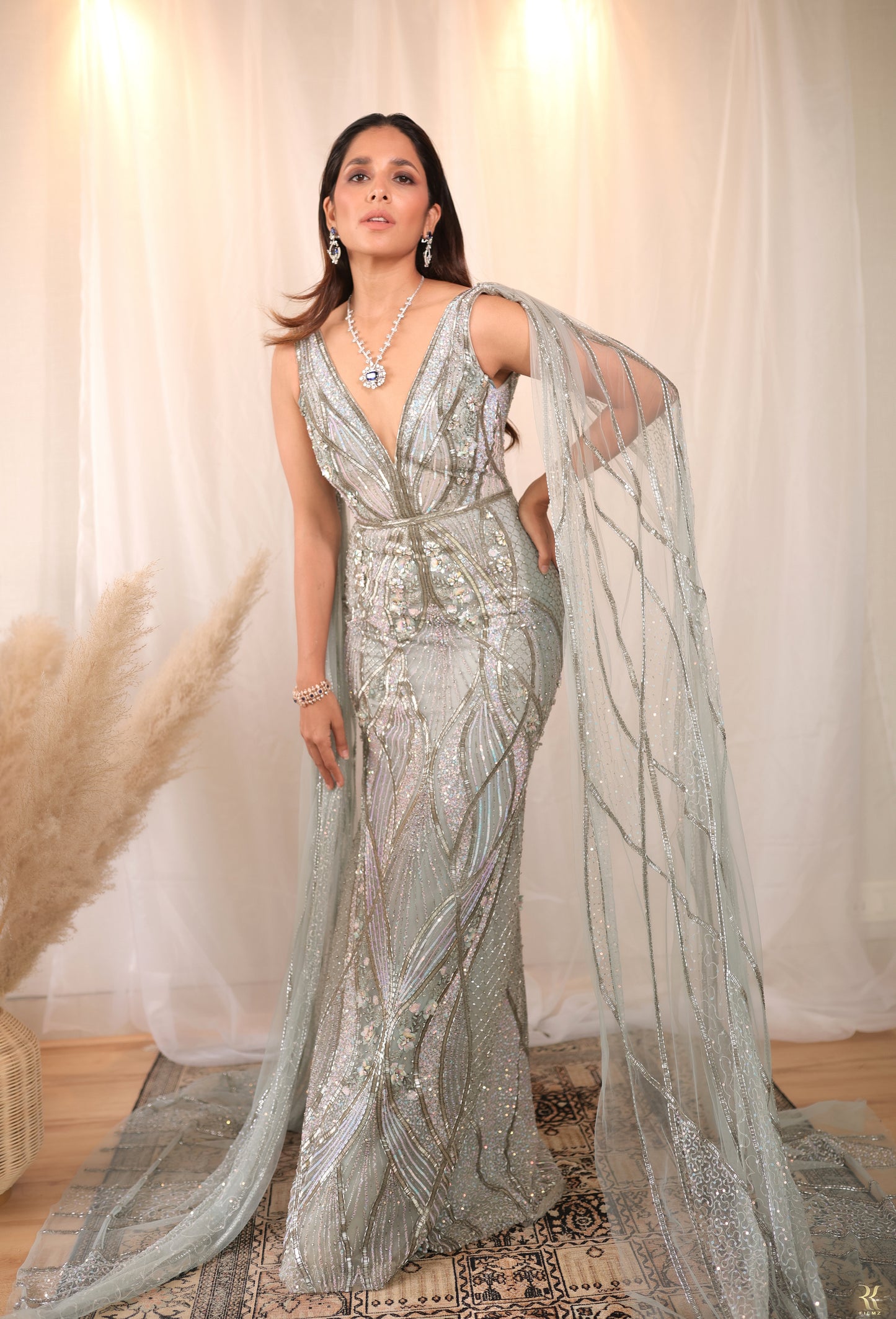 HOUSE OF MISU IN POWDER BLUE GOWN WITH WINGS